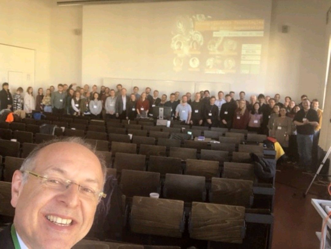 Albrecht Schmidt professor at LMU Munich taking a selfie with all attendees.
